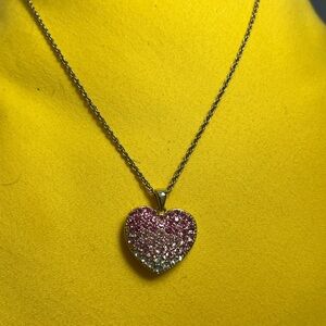 Beautiful heart necklace with pink and crystal stones in a gold setting by Avon